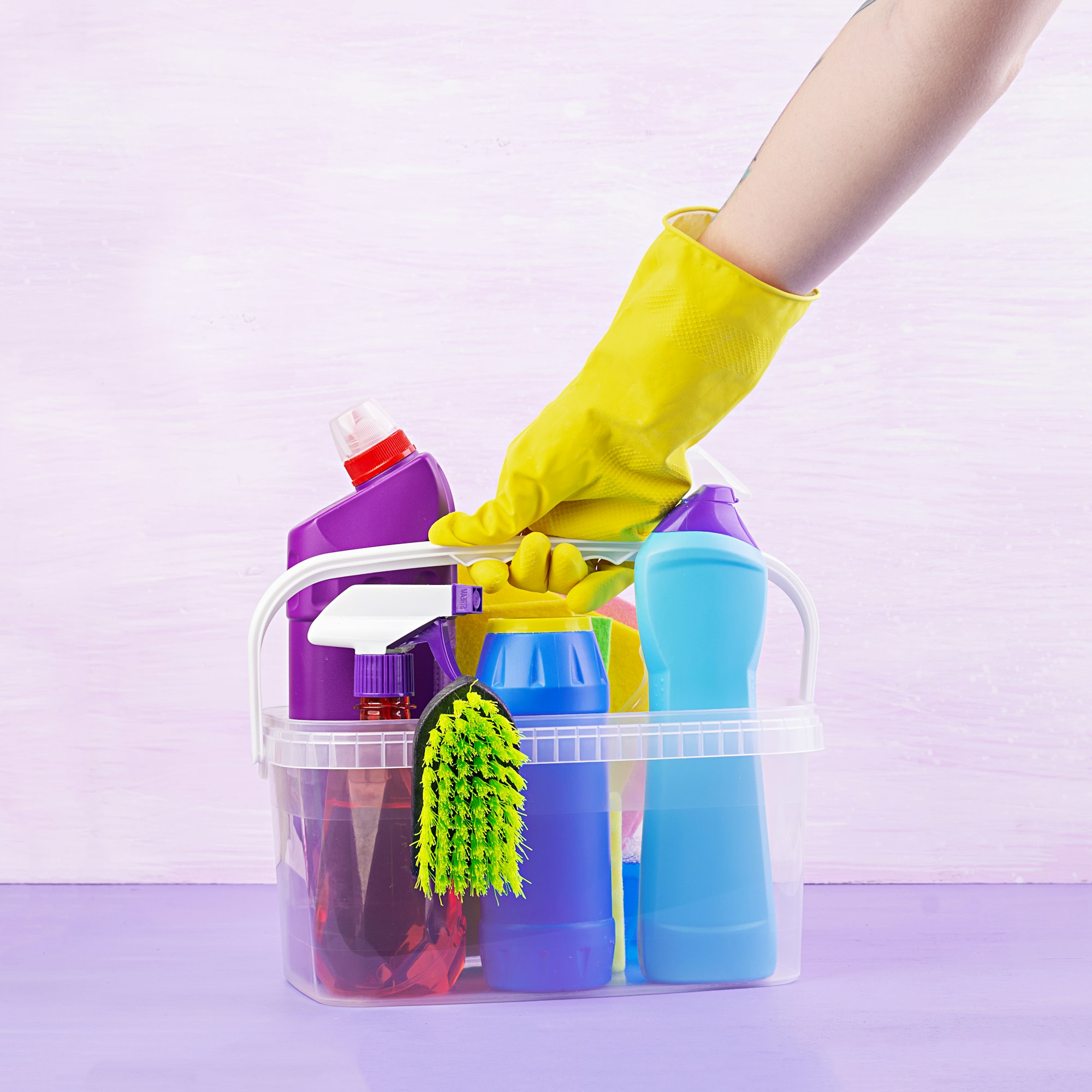 Cleaning service concept. Colorful cleaning set for different surfaces